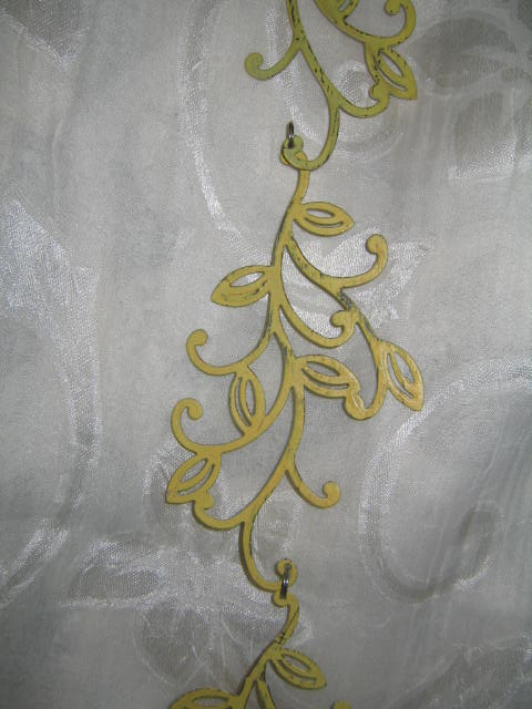 Závěs žlutý ornament